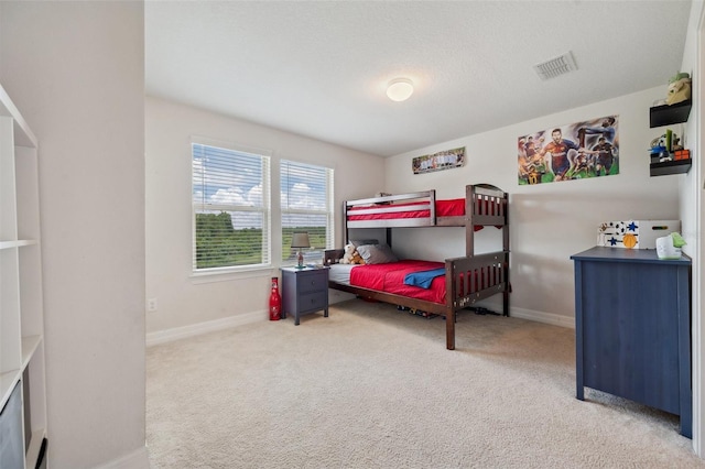18144 Frame Bnd, Land O Lakes, FL 34638 - carpeted bedroom featuring baseboards