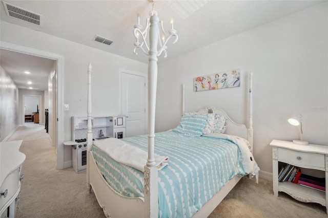 18144 Frame Bnd, Land O Lakes, FL 34638 - bedroom with light colored carpet and a chandelier
