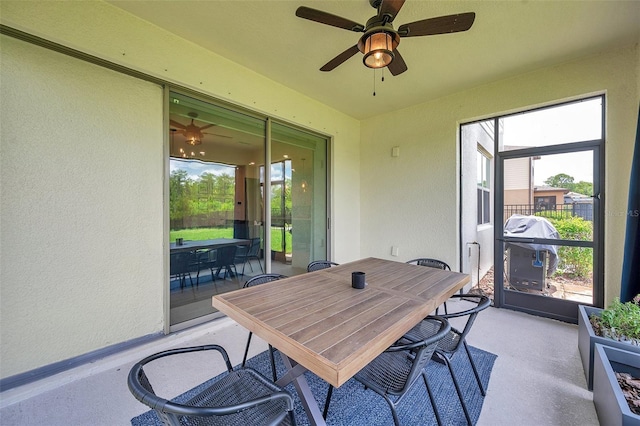 18144 Frame Bnd, Land O Lakes, FL 34638 - sunroom featuring outdoor dining area and ceiling fan