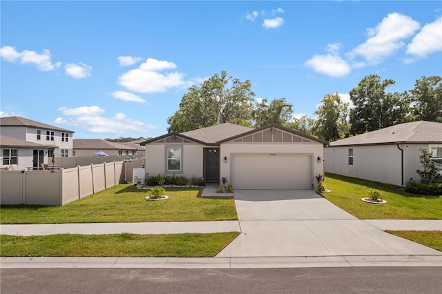 39024 Harlow Rose Dr, Zephyrhills, FL 33540 - view of front of property with a garage, driveway, and stucco siding