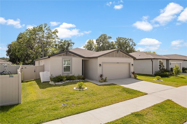39024 Harlow Rose Dr, Zephyrhills, FL 33540 - view of front of home featuring an attached garage, driveway, a gate, and stucco siding