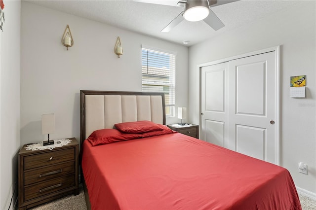 39024 Harlow Rose Dr, Zephyrhills, FL 33540 - bedroom featuring carpet, a closet, and a ceiling fan