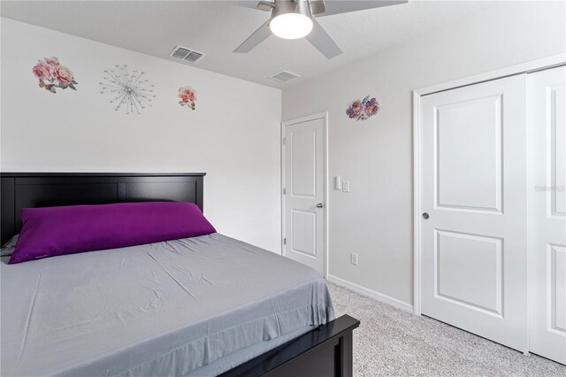 39024 Harlow Rose Dr, Zephyrhills, FL 33540 - bedroom featuring light colored carpet and ceiling fan