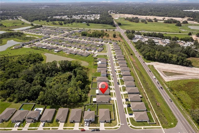 39024 Harlow Rose Dr, Zephyrhills, FL 33540 - aerial view of property's location featuring nearby suburban area and a nearby body of water