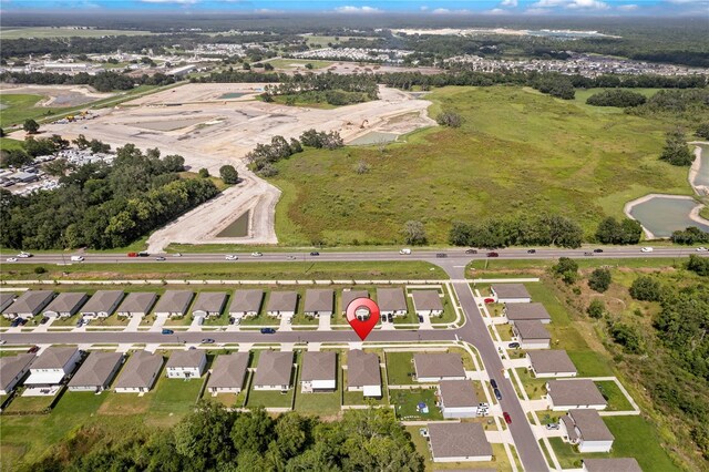 39024 Harlow Rose Dr, Zephyrhills, FL 33540 - aerial view of property and surrounding area with nearby suburban area