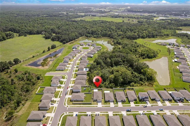 39024 Harlow Rose Dr, Zephyrhills, FL 33540 - aerial overview of property's location featuring a nearby body of water and nearby suburban area