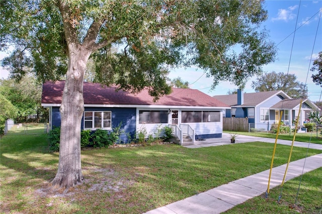1938 E Fern Rd, Lakeland, FL 33801 - single story home featuring a sunroom