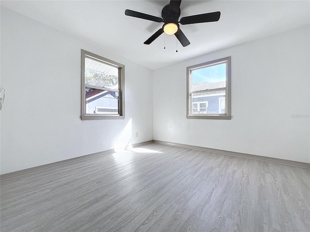 1938 E Fern Rd, Lakeland, FL 33801 - spare room featuring wood finished floors, healthy amount of natural light, and ceiling fan