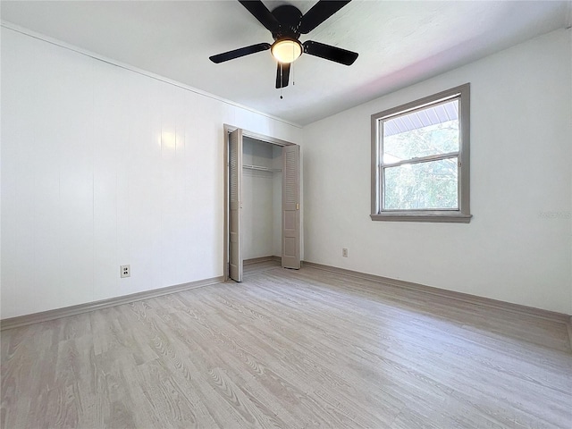 1938 E Fern Rd, Lakeland, FL 33801 - unfurnished bedroom featuring light wood-style floors, a closet, and ceiling fan