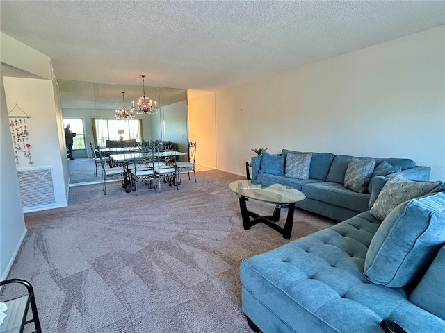 2070 World Parkway Blvd Unit 36, Clearwater, FL 33763 - carpeted living area with a chandelier and a textured ceiling