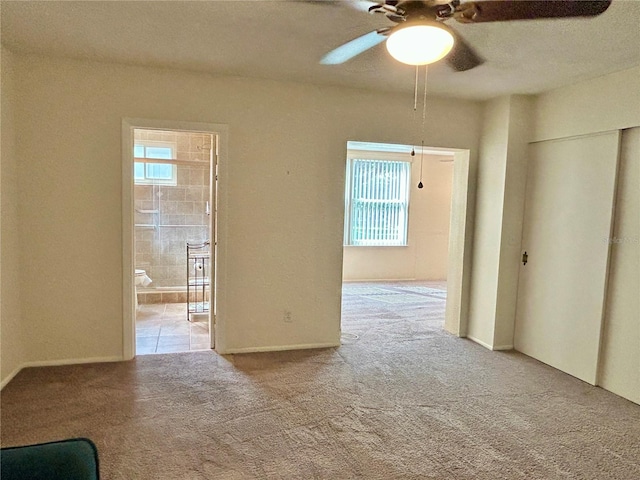2070 World Parkway Blvd Unit 36, Clearwater, FL 33763 - spare room featuring carpet flooring and a ceiling fan