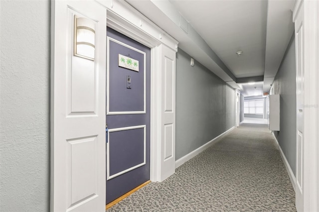 880 Mandalay Ave Unit C513, Clearwater Beach, FL 33767 - corridor featuring baseboards