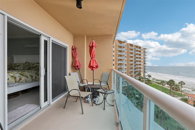 880 Mandalay Ave Unit C513, Clearwater Beach, FL 33767 - balcony featuring view of water and beach