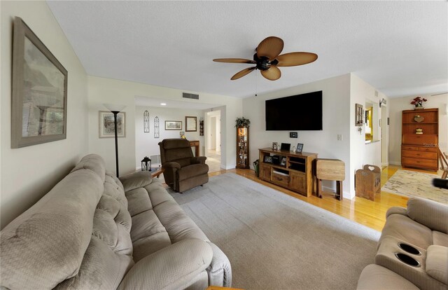 3035 Countryside Blvd Unit 16B, Clearwater, FL 33761 - living area with light wood finished floors and ceiling fan