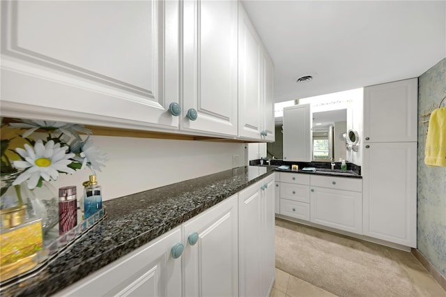 3035 Countryside Blvd Unit 16B, Clearwater, FL 33761 - bathroom featuring vanity and tile patterned flooring