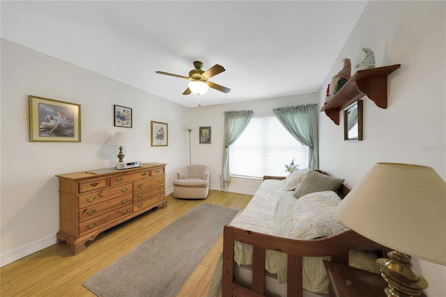 3035 Countryside Blvd Unit 16B, Clearwater, FL 33761 - bedroom with light wood finished floors and ceiling fan