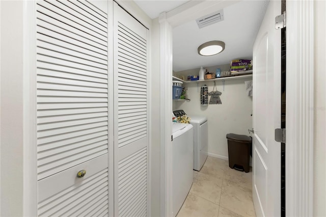 3035 Countryside Blvd Unit 16B, Clearwater, FL 33761 - washroom featuring separate washer and dryer
