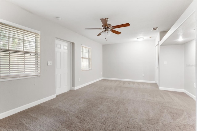 3753 Thornbush Ln, New Port Richey, FL 34655 - empty room featuring a ceiling fan and light carpet