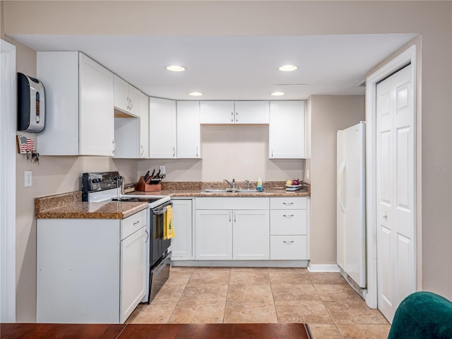 11704 Orange Grove Ter, Riverview, FL 33569 - kitchen featuring white appliances, white cabinetry, and recessed lighting