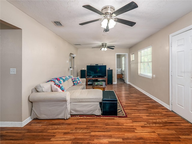 11704 Orange Grove Ter, Riverview, FL 33569 - living area with ceiling fan, wood finished floors, and a textured ceiling