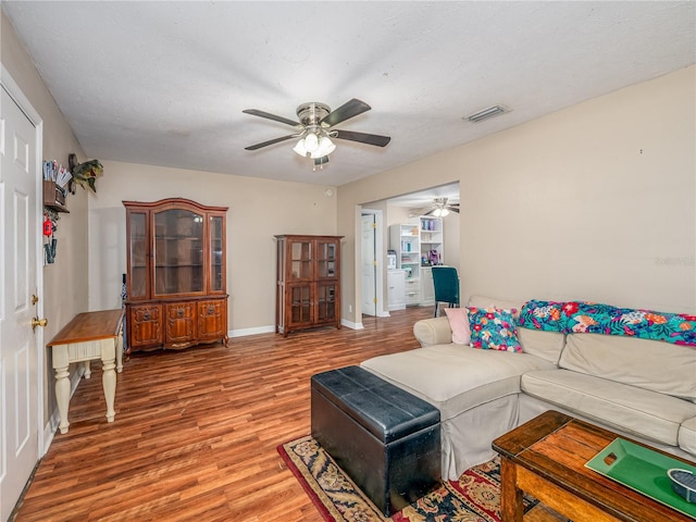 11704 Orange Grove Ter, Riverview, FL 33569 - living area with ceiling fan and light wood finished floors
