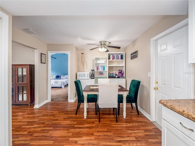 11704 Orange Grove Ter, Riverview, FL 33569 - dining space featuring wood finished floors and ceiling fan