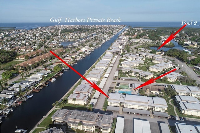 5111 Amulet Dr Unit 208, New Port Richey, FL 34652 - aerial view of property and surrounding area with a nearby body of water and nearby suburban area