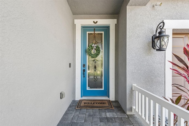 12121 Rustic River Way, Tampa, FL 33635 - entrance to property with stucco siding