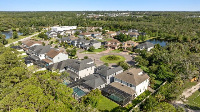 12121 Rustic River Way, Tampa, FL 33635 - drone / aerial view of a forest and a large body of water