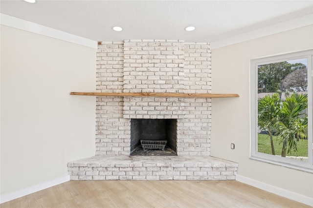 6400 Mockingbird Way S, Saint Petersburg, FL 33707 - detailed view of wood finished floors, recessed lighting, and a fireplace