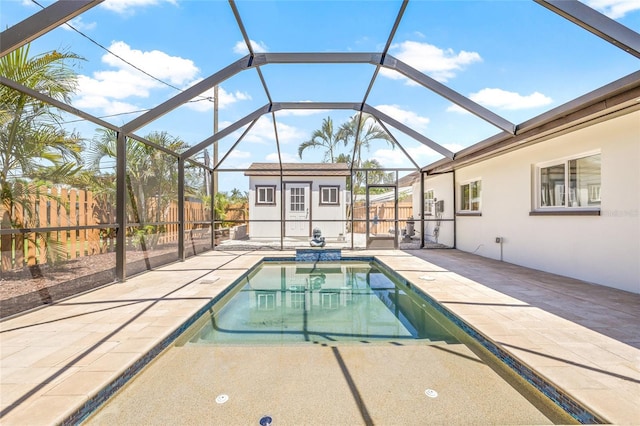 6400 Mockingbird Way S, Saint Petersburg, FL 33707 - swimming pool featuring a patio, a fenced backyard, a shed, and glass enclosure