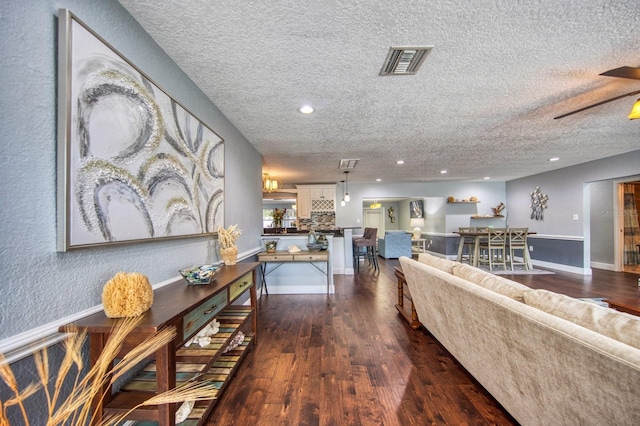 3173 Fountainhead Dr, Largo, FL 33770 - living room featuring a textured ceiling, wood finished floors, recessed lighting, and ceiling fan