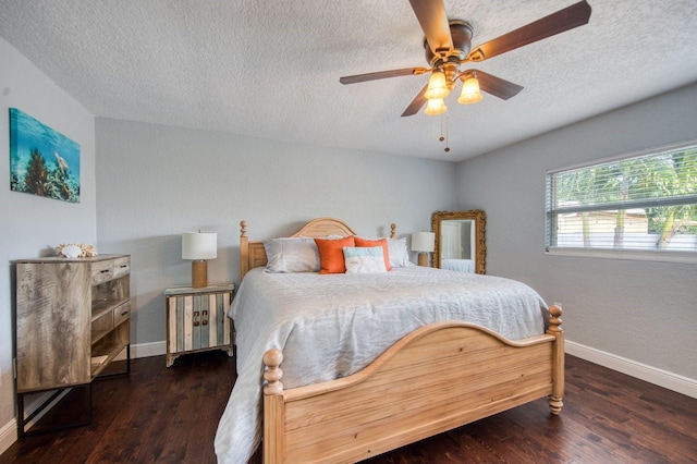 3173 Fountainhead Dr, Largo, FL 33770 - bedroom with a textured ceiling, wood finished floors, and a ceiling fan