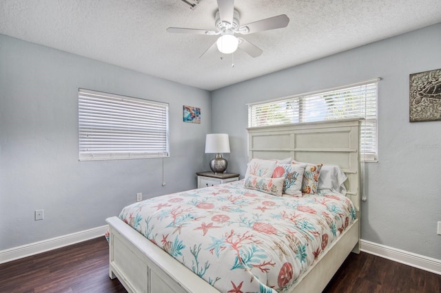 3173 Fountainhead Dr, Largo, FL 33770 - bedroom with wood finished floors, a textured ceiling, and a ceiling fan