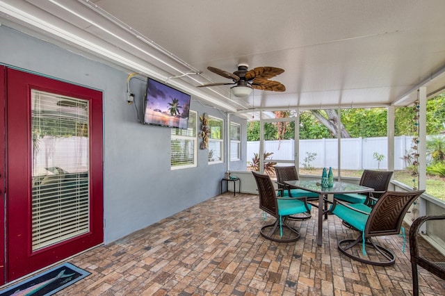 3173 Fountainhead Dr, Largo, FL 33770 - sunroom with a ceiling fan, outdoor dining area, and healthy amount of natural light