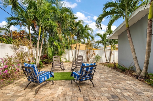 3173 Fountainhead Dr, Largo, FL 33770 - fenced backyard featuring a patio