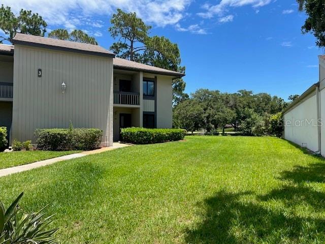 140 Nina Way, Oldsmar, FL 34677 - view of grassy yard