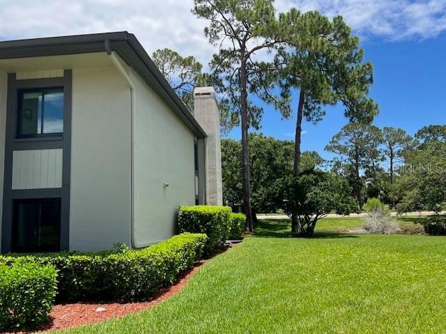 140 Nina Way, Oldsmar, FL 34677 - view of grassy yard