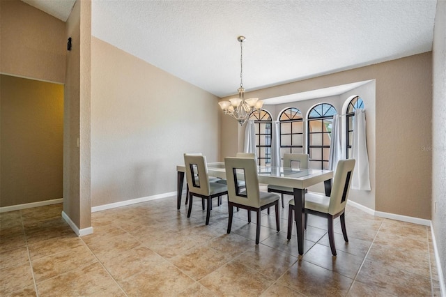 13167 Roseanna Dr, Spring Hill, FL 34609 - dining room featuring a chandelier, a textured wall, and a textured ceiling