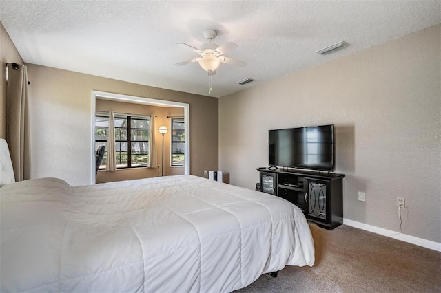 13167 Roseanna Dr, Spring Hill, FL 34609 - bedroom featuring carpet, a textured ceiling, ceiling fan, and a textured wall