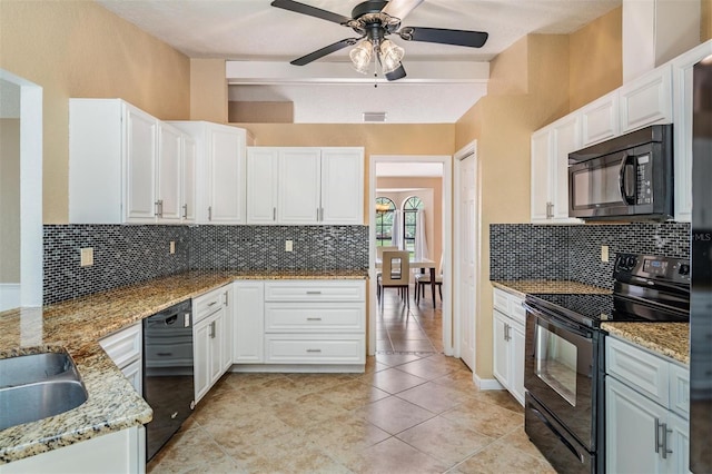 13167 Roseanna Dr, Spring Hill, FL 34609 - kitchen featuring black appliances, a ceiling fan, backsplash, and light stone counters