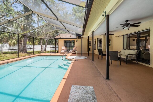 13167 Roseanna Dr, Spring Hill, FL 34609 - view of pool with a patio area, outdoor lounge area, a ceiling fan, and a lanai