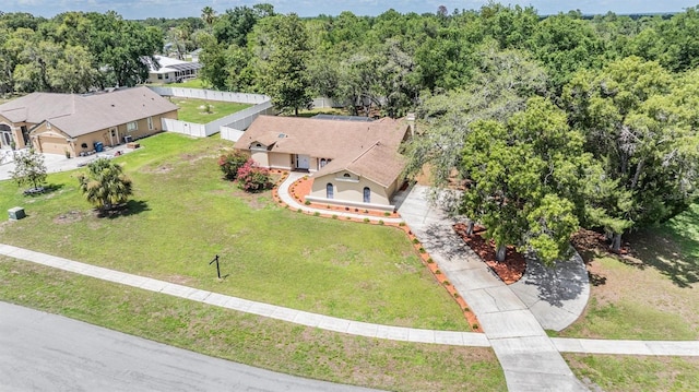 13167 Roseanna Dr, Spring Hill, FL 34609 - aerial view of property and surrounding area with a heavily wooded area