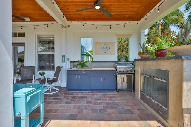 5710 Tortoise Pl, Apollo Beach, FL 33572 - view of patio / terrace featuring exterior kitchen and ceiling fan