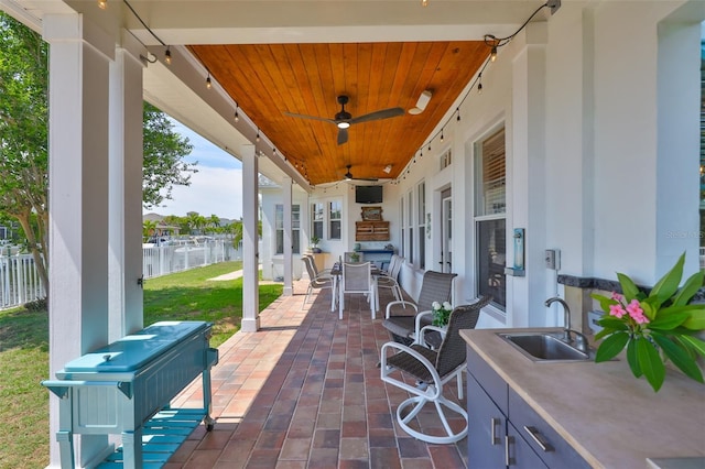 5710 Tortoise Pl, Apollo Beach, FL 33572 - view of patio / terrace featuring a sink and ceiling fan