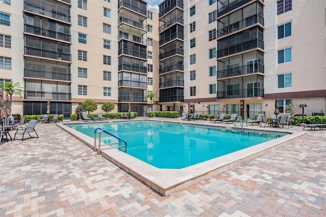 2901 W 26th St Unit 301, Bradenton, FL 34205 - community pool featuring a patio area