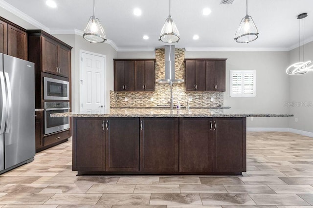 21675 Amelia Rose Way, Land O Lakes, FL 34637 - kitchen featuring stainless steel appliances, wall chimney range hood, recessed lighting, dark brown cabinetry, and tasteful backsplash