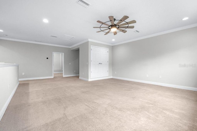 21675 Amelia Rose Way, Land O Lakes, FL 34637 - spare room with ceiling fan, ornamental molding, light carpet, recessed lighting, and attic access