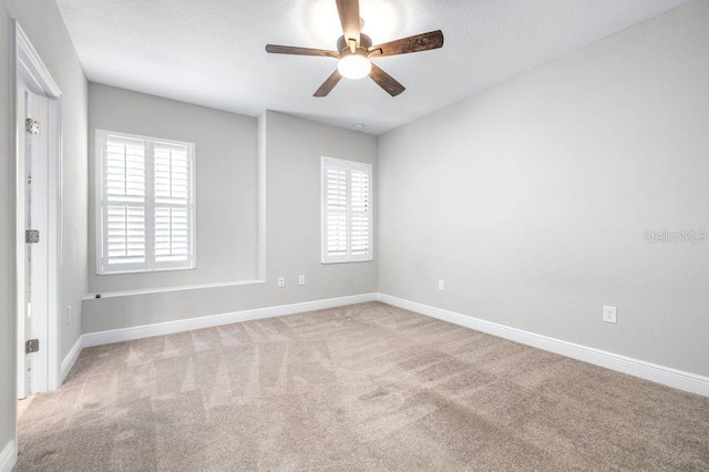 21675 Amelia Rose Way, Land O Lakes, FL 34637 - unfurnished bedroom with carpet and a ceiling fan