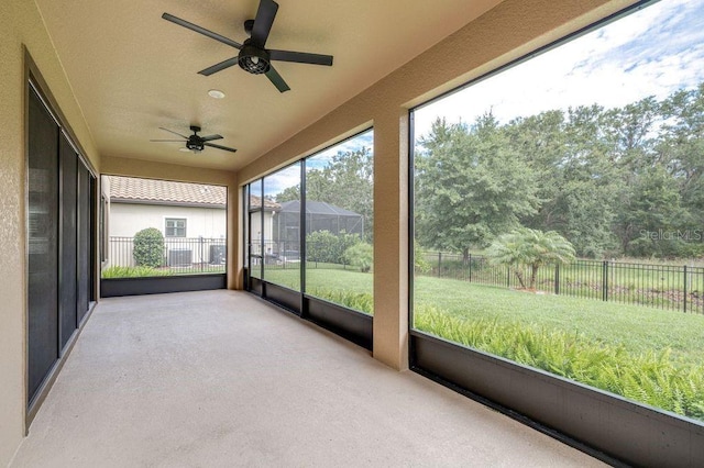 21675 Amelia Rose Way, Land O Lakes, FL 34637 - unfurnished sunroom with ceiling fan